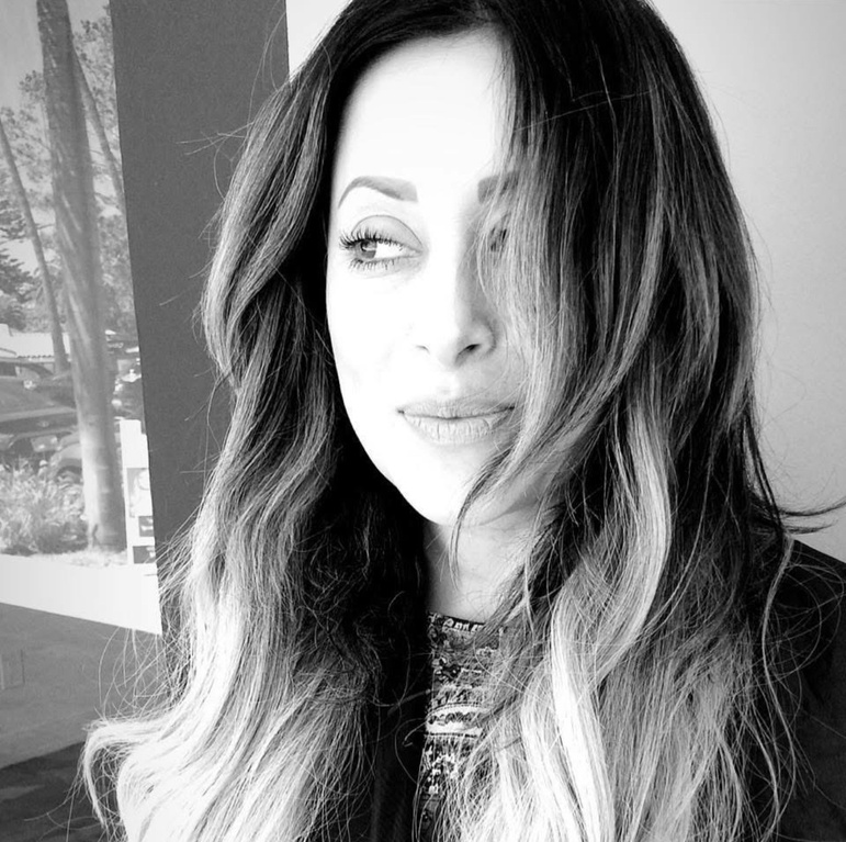 Dunia, owner and stylist, black and white portrait